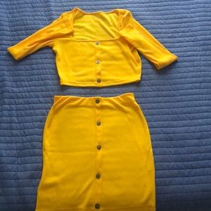 Long sleeve crop top skirt set.